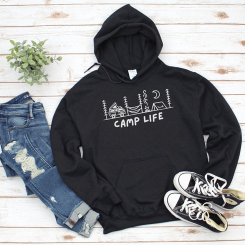 Introducing the ultimate companion for your outdoor adventures: the Camp Life Hoodie. Designed for those who find solace under the stars and joy by the campfire, this hoodie encapsulates the essence of camping. Featuring a picturesque camping scene that speaks directly to the heart of outdoor enthusiasts